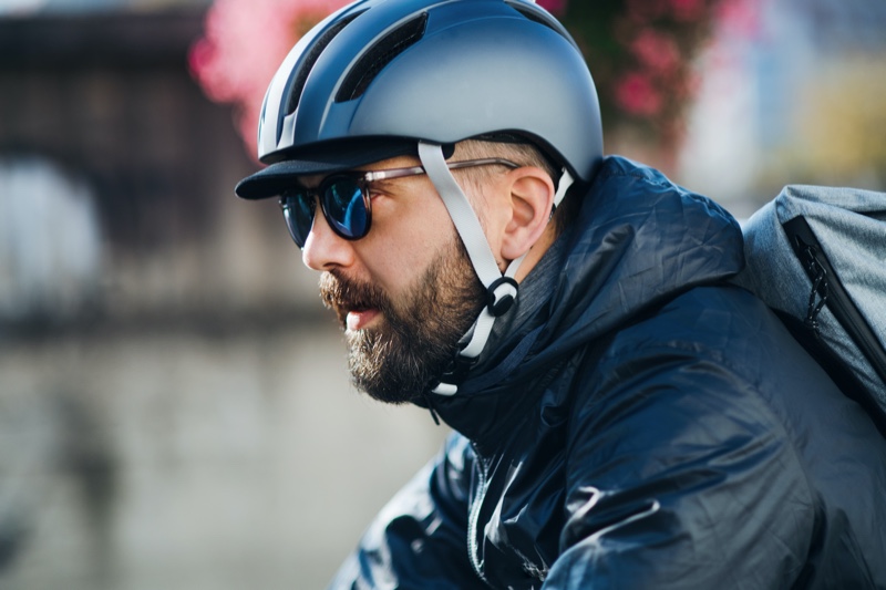 Messenger Wearing Helmet Sunglasses