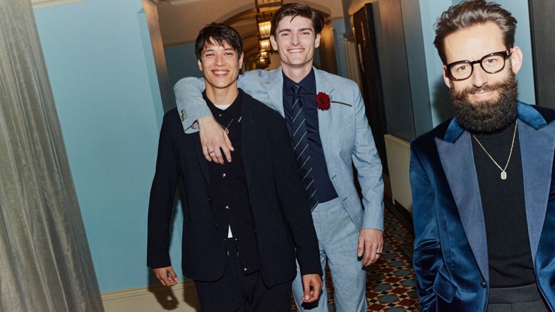 Left to Right: Aaron Unknown wears a Paul Smith unstructured wool-blend jacquard suit jacket, Merino wool cardigan, and straight-leg textured wool-blend drawstring suit trousers. Alexander Beck models a Paul Smith virgin wool, linen, and silk-blend suit jacket and trousers with a slim-fit cotton-poplin shirt and 8cm striped silk-jacquard tie. Wojtek van Portek dons a Favourbrook slim-fit Grossgrain-trimmed cotton-velvet tuxedo jacket with a Paul Smith cashmere turtleneck sweater.