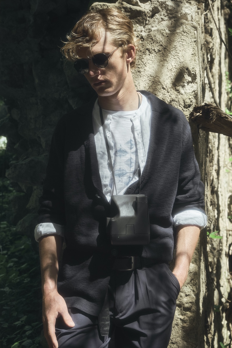 Cristian wears belt Comme des Garçons, sunglasses Ray-Ban, t-shirt, shirt, cardigan, and pants Diktat. » Cristian Aneris Takes to Valle delle Ferriere in Summer Style by Diktat Cristian wears belt Comme des Garçons, sunglasses Ray-Ban, t-shirt, shirt, cardigan, and pants Diktat.