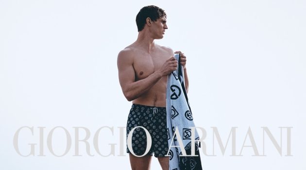 Julian & Francisco Take to the Sea for Giorgio Armani Mare Campaign Julian Schneyder Model Shirtless Swim Shorts Giorgio Armani Mare Campaign Summer 2022 Towel Logos