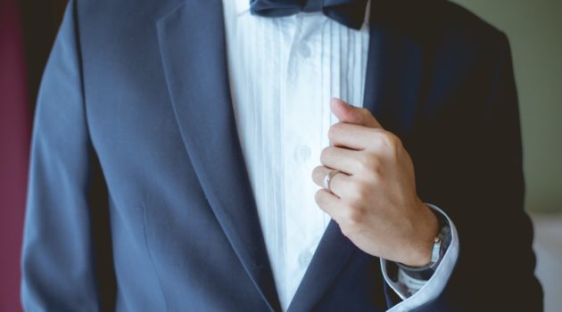 Ultimate Guide To Men's Celtic Wedding Bands Groom Wearing Wedding Band Suit
