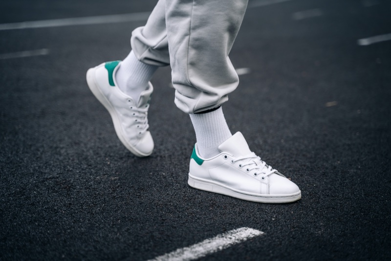 Guy Walking White Sneakers Green Detail