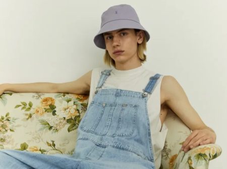 Denim overalls make a comeback as Ati Oppelt rocks a pair from H&M's latest arrivals for men.