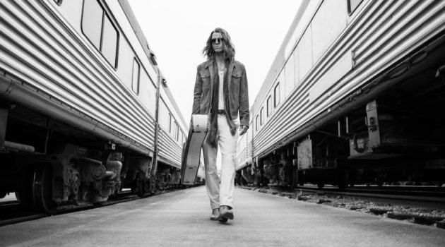 Jökull JúlÃusson Boards a Train for John Varvatos Pre-fall '22 Campaign Jökull JúlÃusson Train Station John Varvatos Campaign Pre-fall 2022