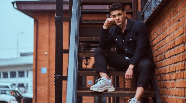 Designer Sneaker Trends: What to Expect in 2022 Male Model Chunky Sneakers Black Jacket Pants
