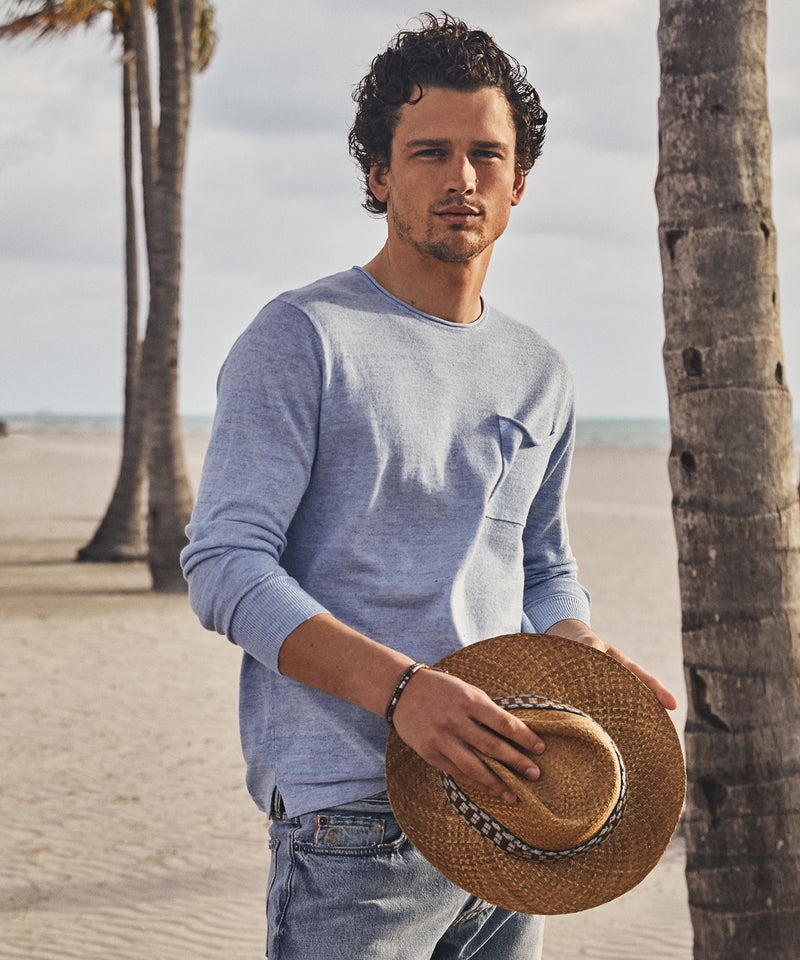 Going casual in a summer essential, Simon Nessman sports Todd Snyder's linen Shore sweater in blue willow.
