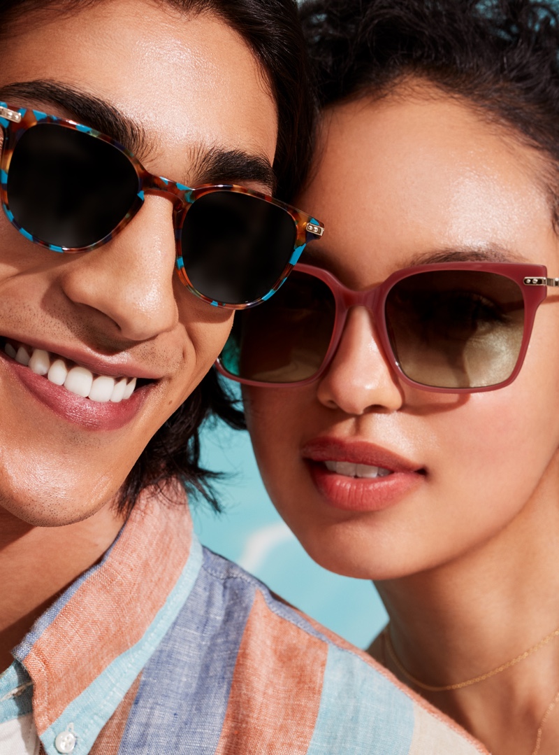 Pictured left, Adarsh Jaikarran makes a statement in Warby Parker's Kian sunglasses in Teal Tortoise with Polished Gold. Pictured right are the brand's Vela sunglasses in Terracotta with Polished Gold.