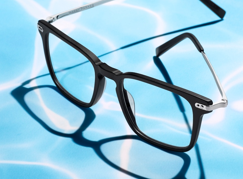 Classic and contemporary design come together as Warby Parker offers its Raul glasses in Jet Black Matte with Polished Silver.