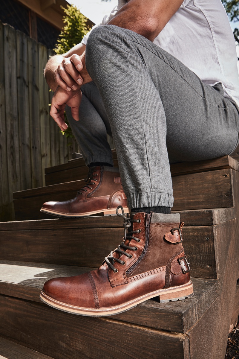 Ready for fall, Eric Decker wears Crown Vintage boots in brown for DSW's back-to-school campaign.