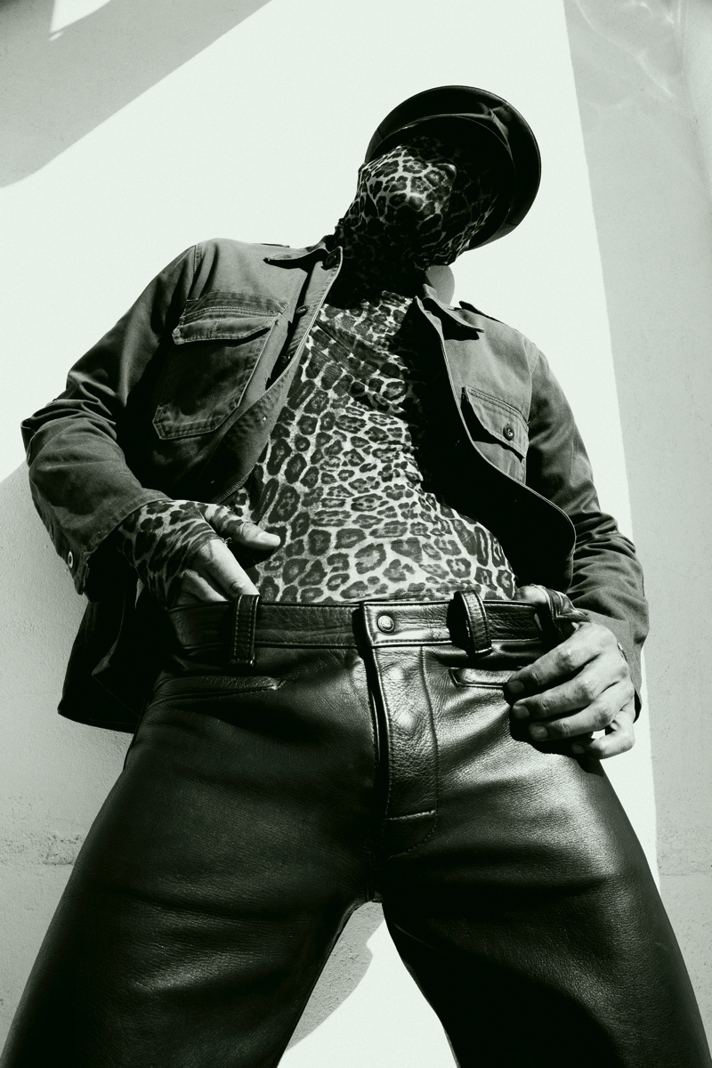 Luiz wears top Ellias Kaleb, cap and leather pants stylist's own.