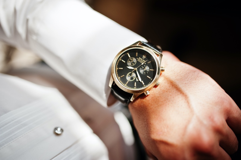 Man Looking at Rolex Watch Closeup