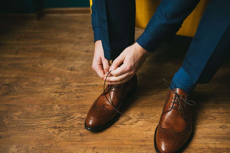 Man Tying Dress Shoes Leather Brown