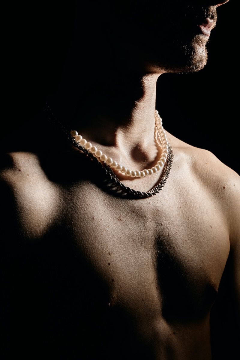 Man Wearing Pearl Necklace