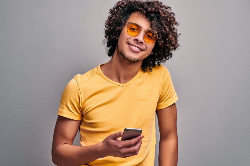 Tanned Man Curly Hair Sunglasses Phone