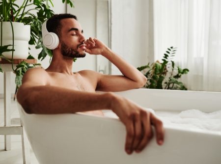Ways to Have a Relaxing Night at Home Attractive Man Tub Listening Music