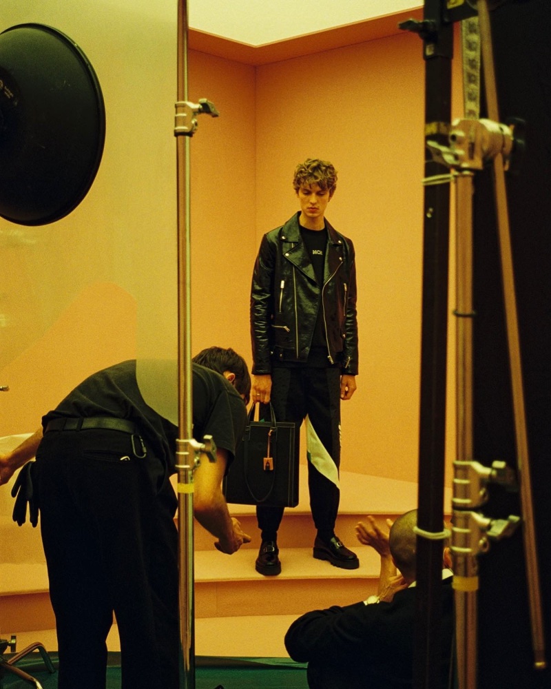 Behind the Scenes: Shooting MCM's fall-winter 2022 campaign, Leon Dame wears the brand's leather MCMotor biker jacket. 