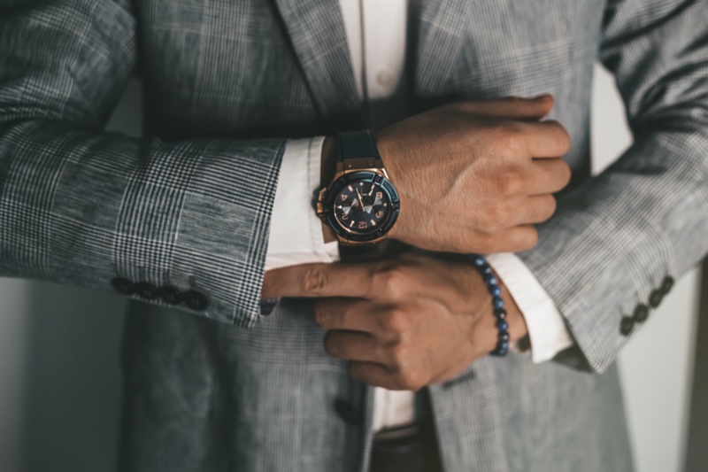 Man Wearing Suit Watch Beaded Bracelet