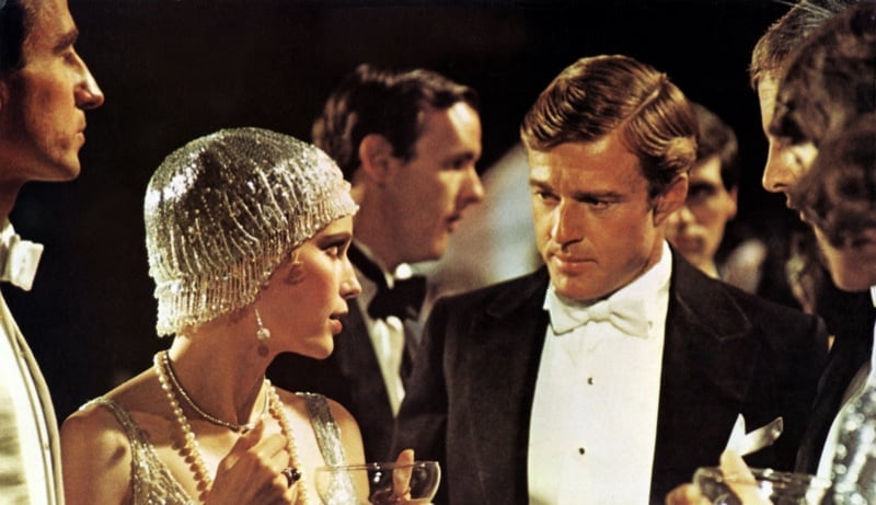 Mia Farrow and Robert Redford in white tie at party Great Gatsby 1974