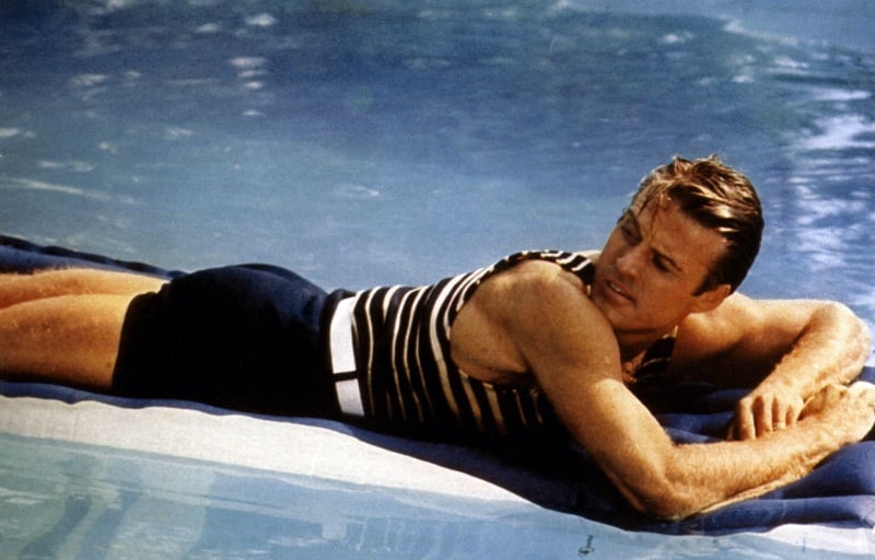 Robert Redford in striped swimwear by pool Great Gatsby 1974