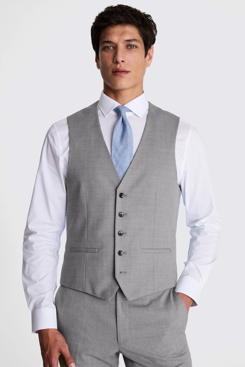 A light gray waistcoat with matching trousers and a white dress shirt from Moss