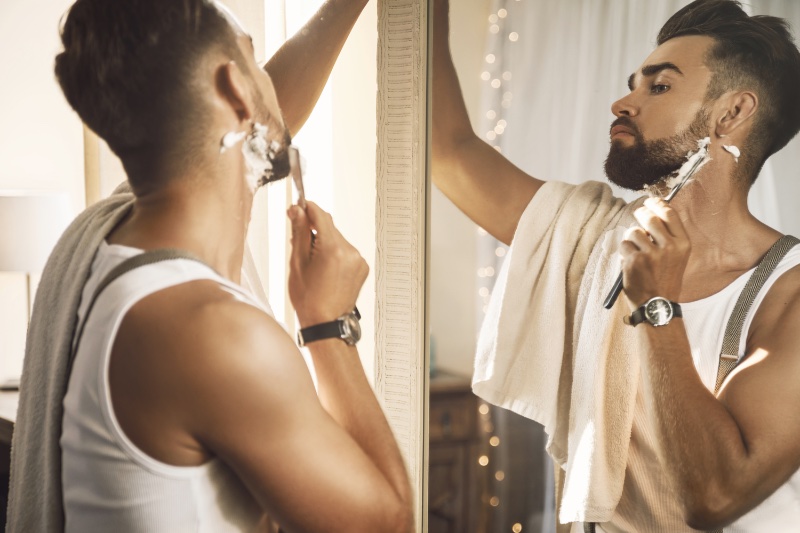 Man Shaving Straight Razor