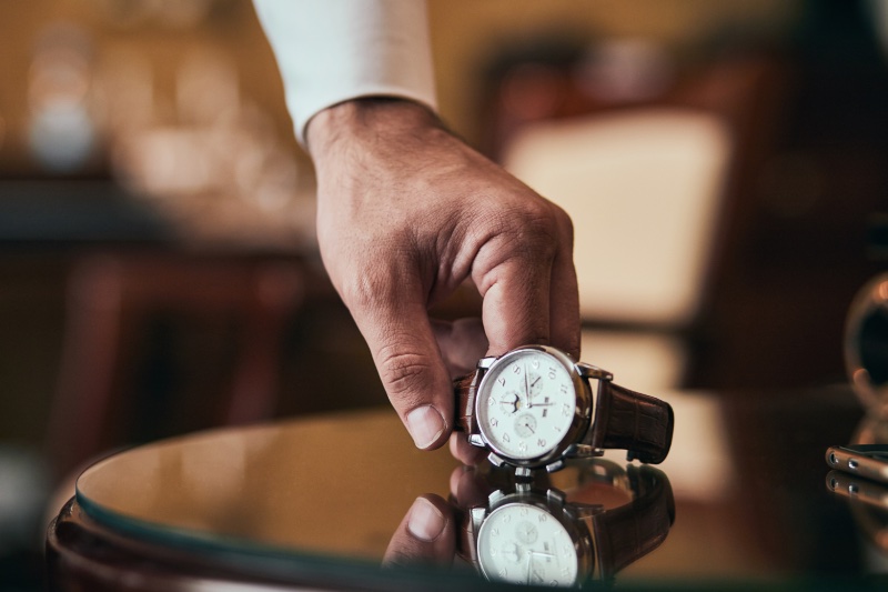 Man Reaching for Watch Man Reaching for Watch