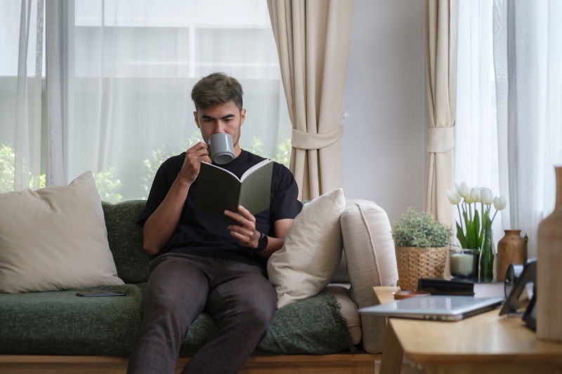 Man Reading Book Home Couch