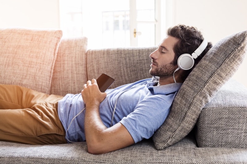 Man Relaxing Home Couch