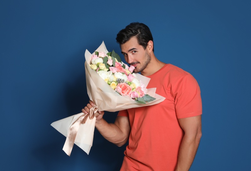 Man with Bouquet of Flowers