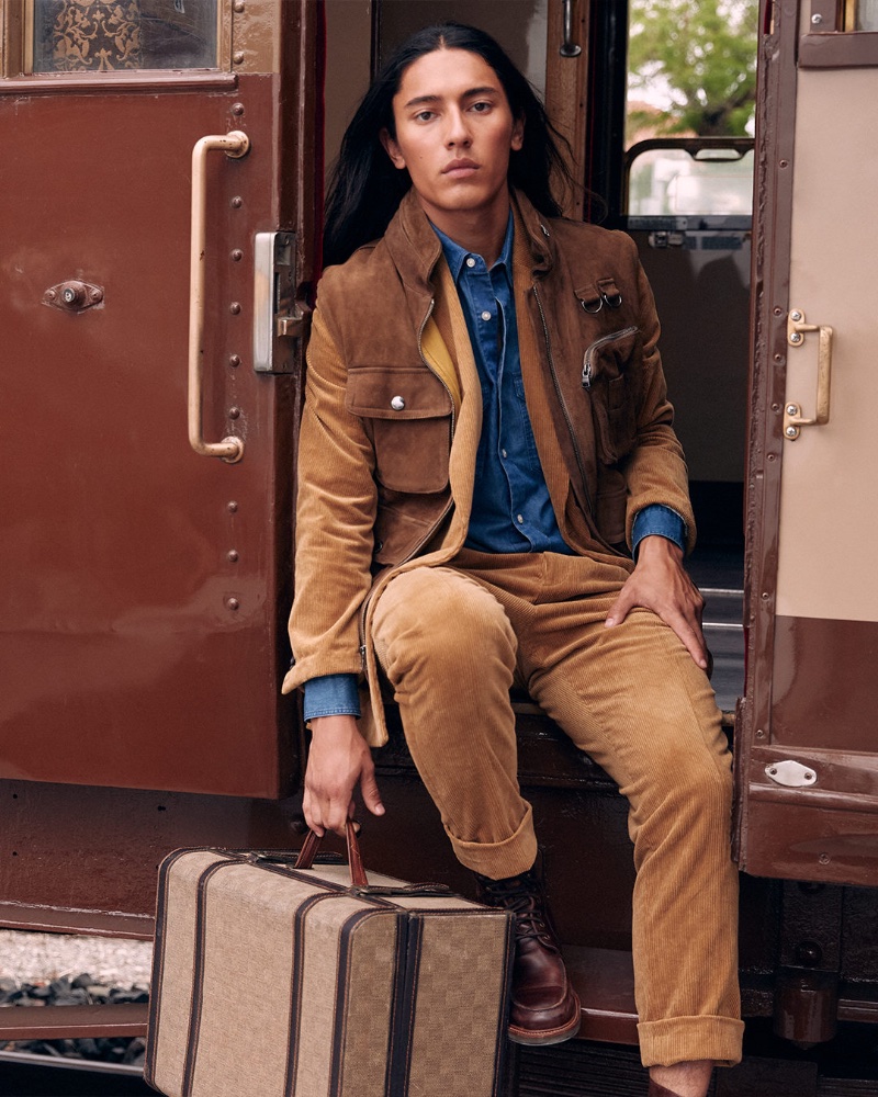 Embracing the spirit of adventure, Cherokee Jack stuns in a brown and blue look from Banana Republic.
