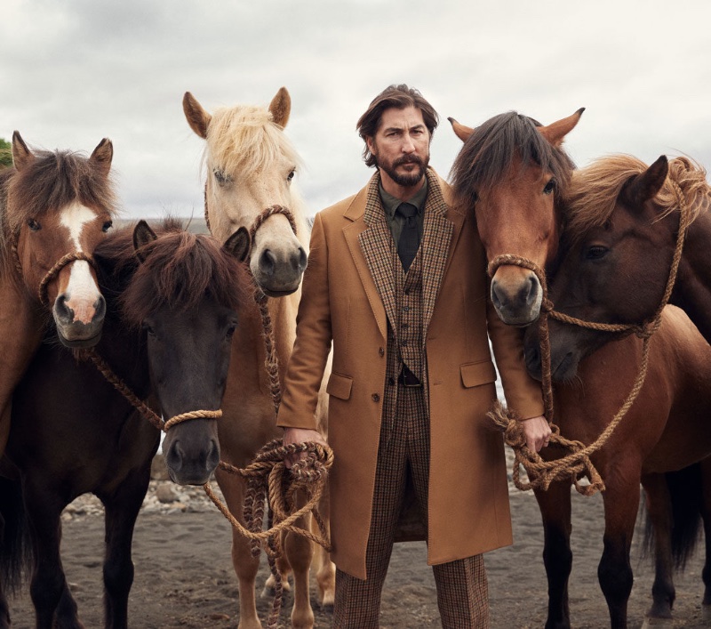 Posing with horses, Ryan Porter stars in Banana Republic's fall-winter 2022 campaign.