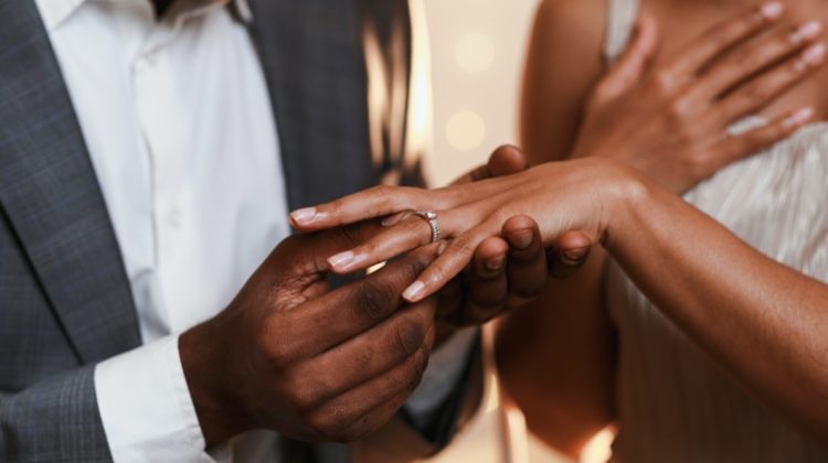 couple getting engaged hands