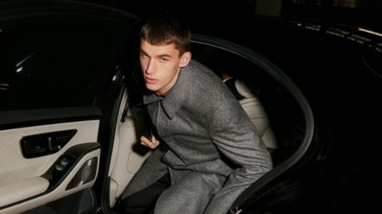 Matthew Rahill prepares to hit the red carpet in a gray coat by Dunhill.
