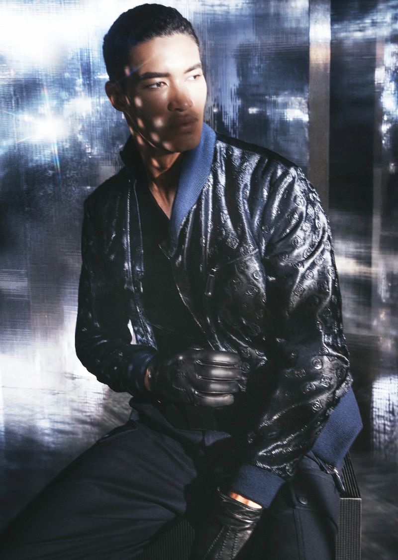Rocking a leather jacket, Raphael Balzer stars in Giorgio Armani's holiday 2022 campaign.