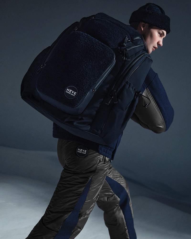 Showing off a stylish new backpack, Kit Butler connects with Giorgio Armani Neve for fall-winter 2022-23.