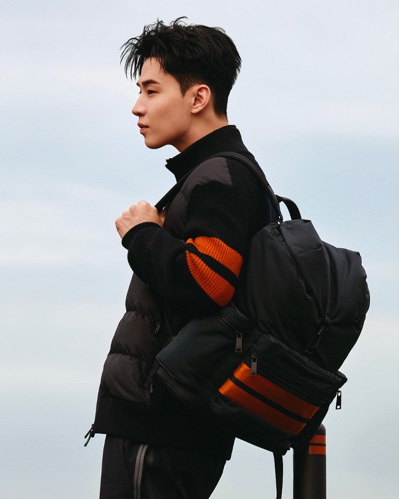 Zegna enlists Henry Lau to star in its new ad for its Outdoor collection.