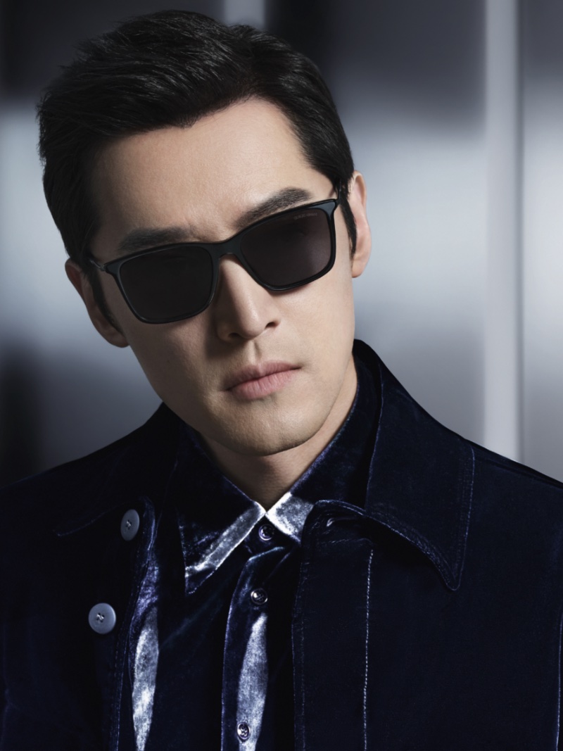 Giorgio Armani brand ambassador Hu Ge wears sunglasses for the fashion house's fall-winter 2022 eyewear campaign.
