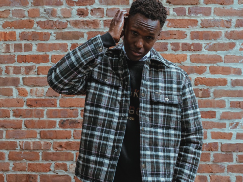 Christopher Gary Lawson wears a quilted overshirt from the Lee x The Brooklyn Circus collection.