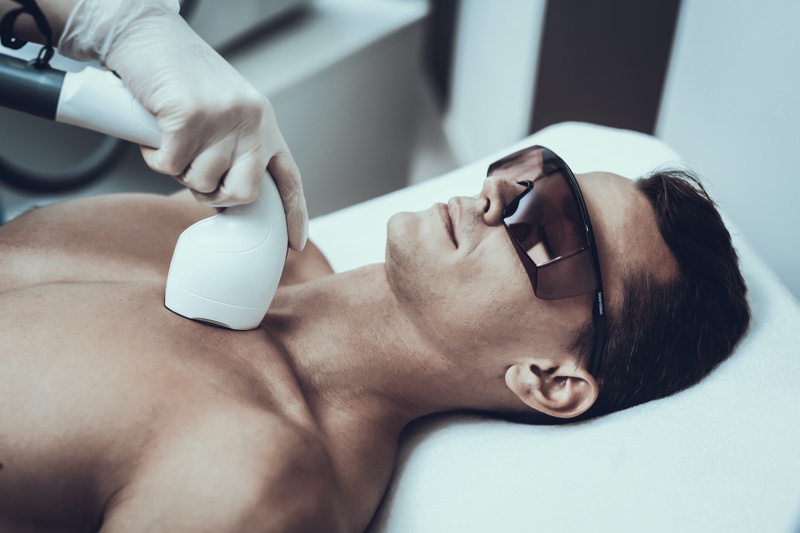 man getting laser hair removal