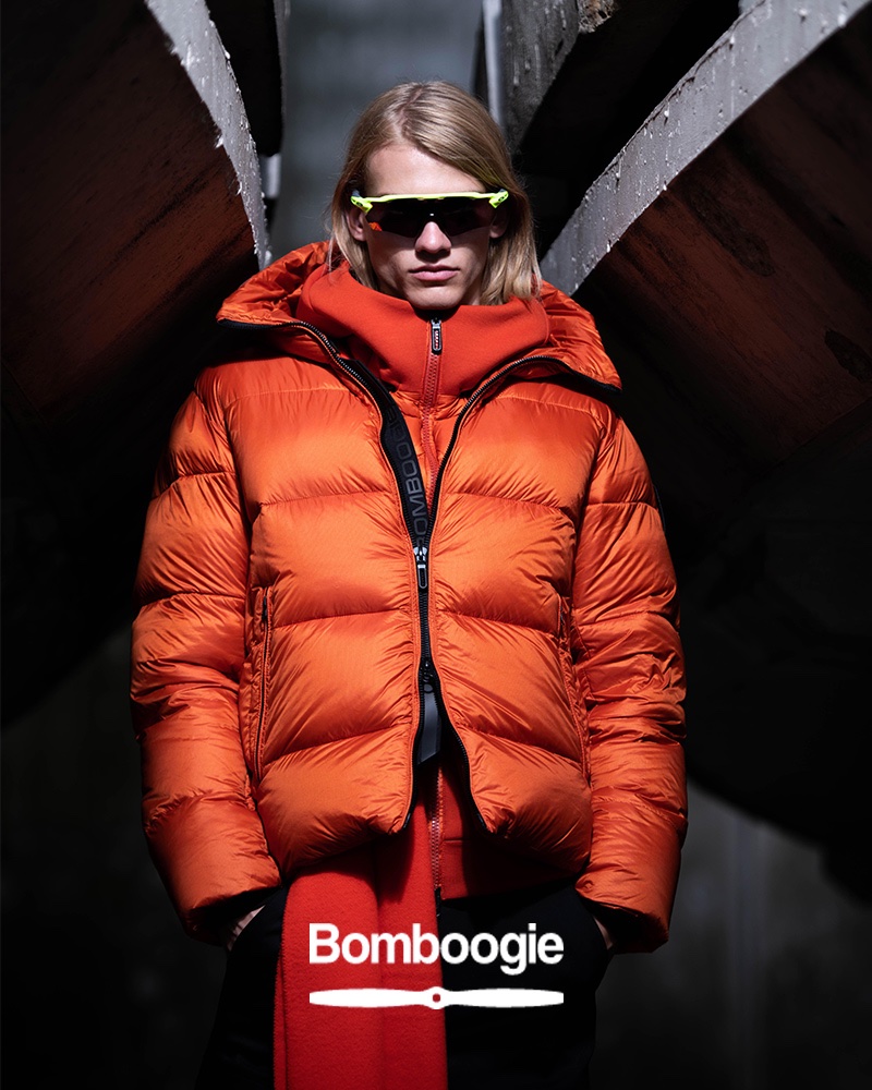 Martijn Faaij stands out in an orange puffer jacket by Bomboogie.