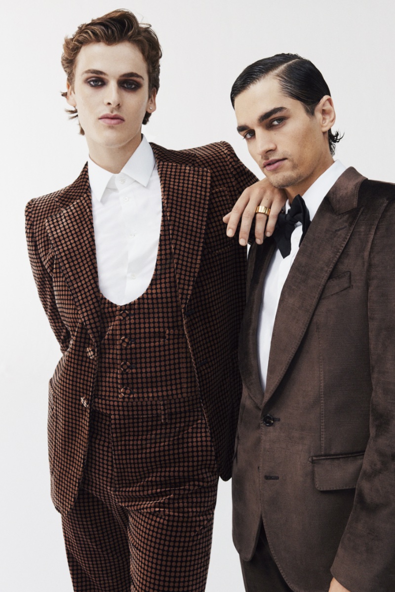 Conor Walmsley and Manu Kumar star in Mytheresa's holiday 2022 campaign. Left, Conor dons a Gucci polka dot velvet suit. Manu wears Dolce & Gabbana.