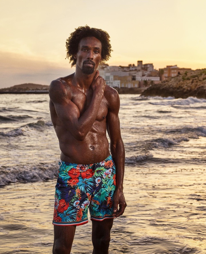 Look to Orlebar Brown to serve up a color of splash for the season with its signature swim shorts donned by Eduardo Philippe. 