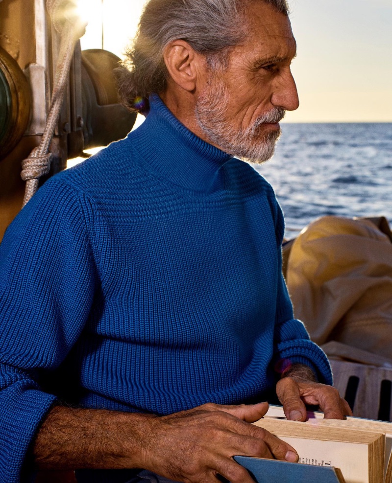 Designing for all ages, Orlebar Brown makes a statement in signal blue with its merino sweater worn by Alejandro B. 