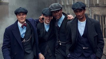 Models Hugh Laughton-Scott, Kit Butler, Hamid Onifade, and Rishi Robin don classic tailoring and newsboy caps for the fall-winter 2022 Polo Original Ralph Lauren campaign.