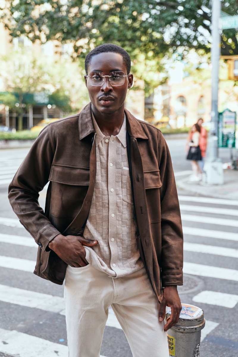 A smart vision, Babajide Alao wears Paradigm's Marvin glasses from its winter 2022 collection. 