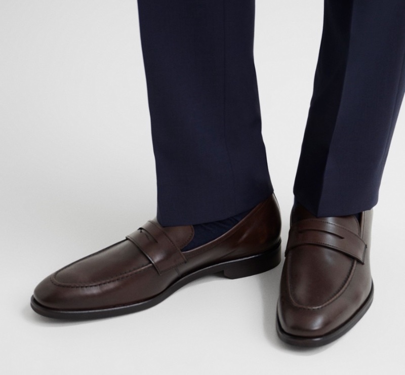 Reiss' stylish brown saddle loafers look great with a pair of trousers.