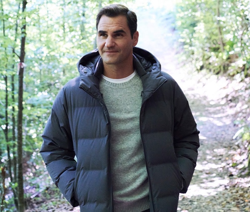 Roger Federer wears a UNIQLO seamless down 3D cut parka in navy.