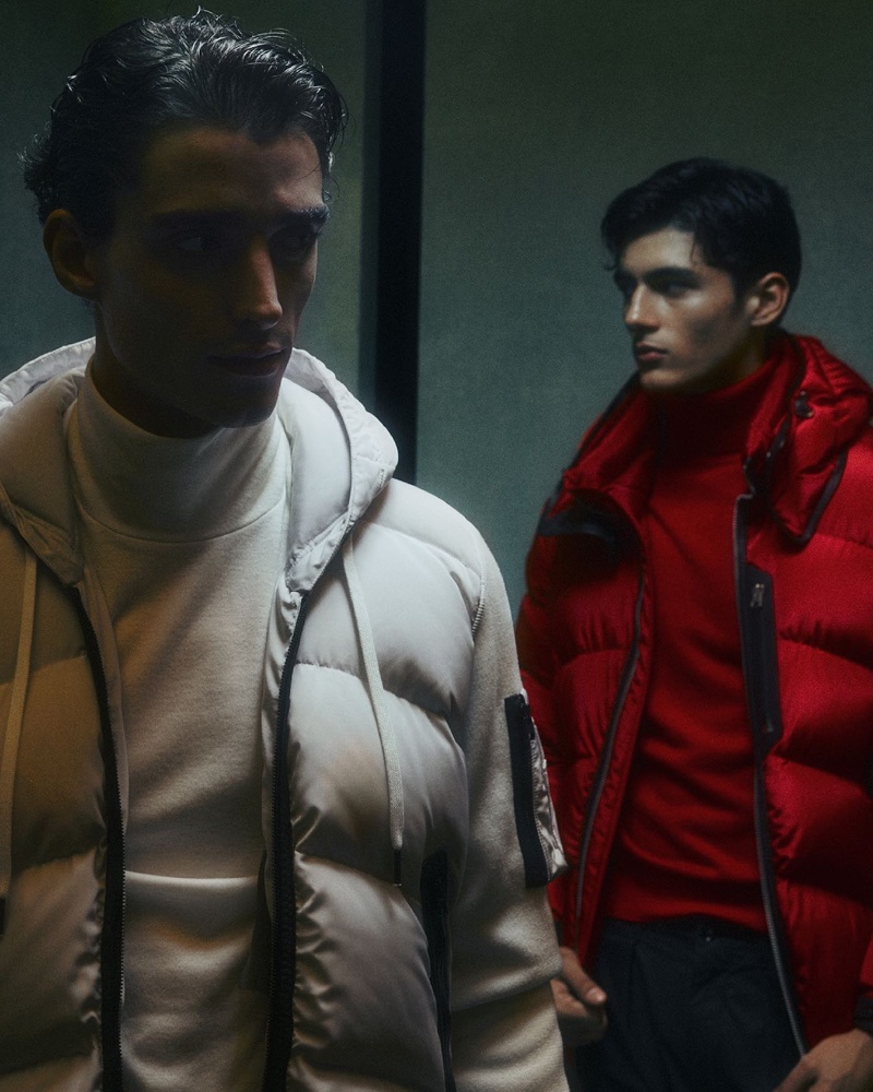 Monochrome style is front and center as Akbar Shamji models turtlenecks and down jackets from Tom Ford.