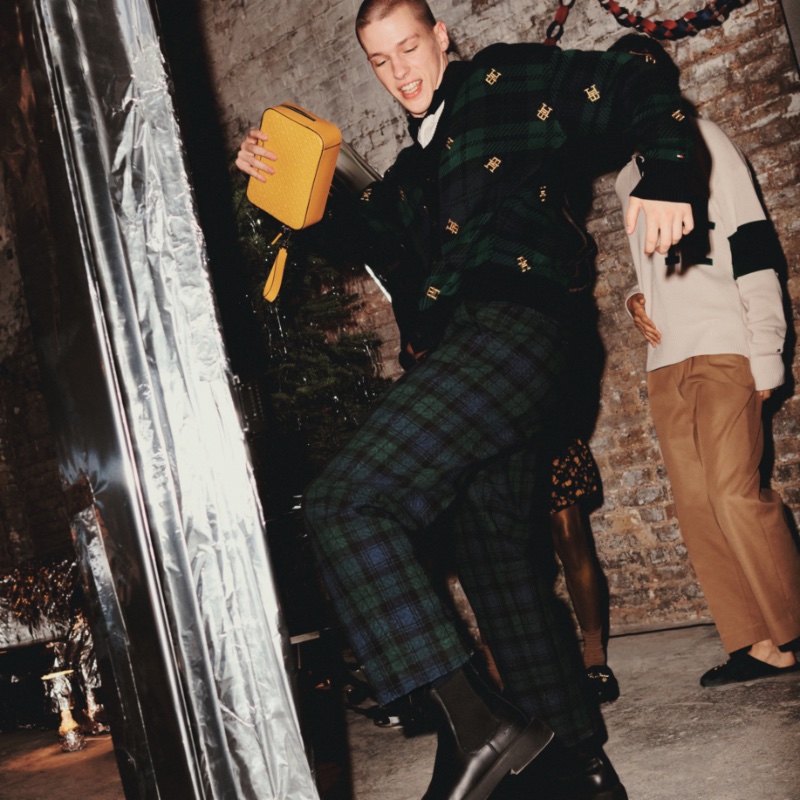 Dancer Sam Dilkes gets in the festive spirit for the holidays, starring in Tommy Hilfiger's newest campaign.