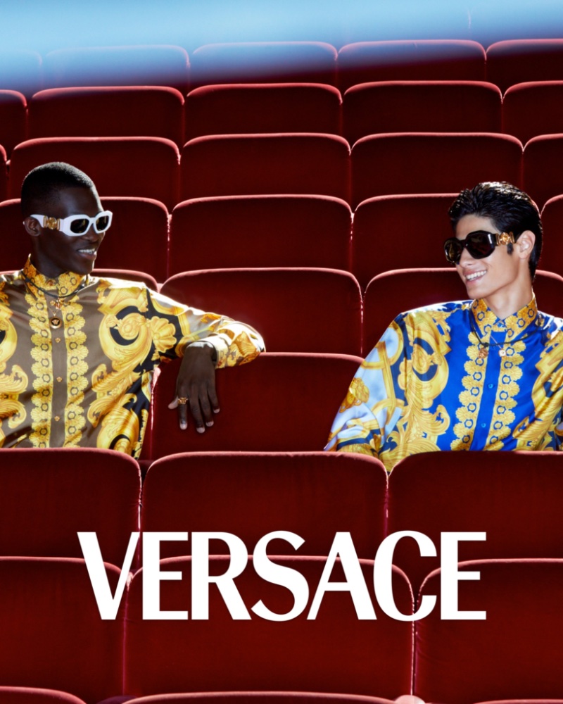 Grinning, Ismael Savane and Brando Erba star in Versace's holiday 2022 campaign.